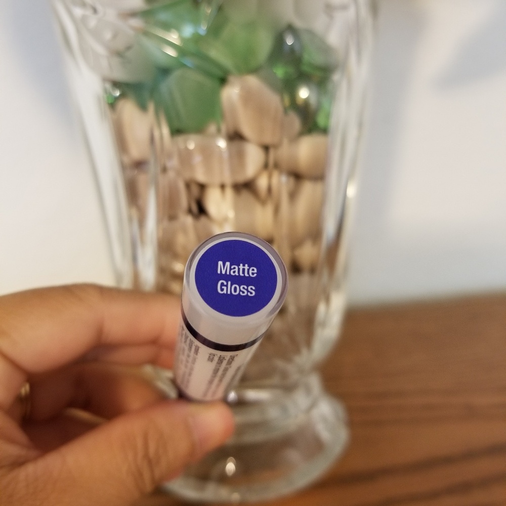 Matte gloss by lip sense Senegence.